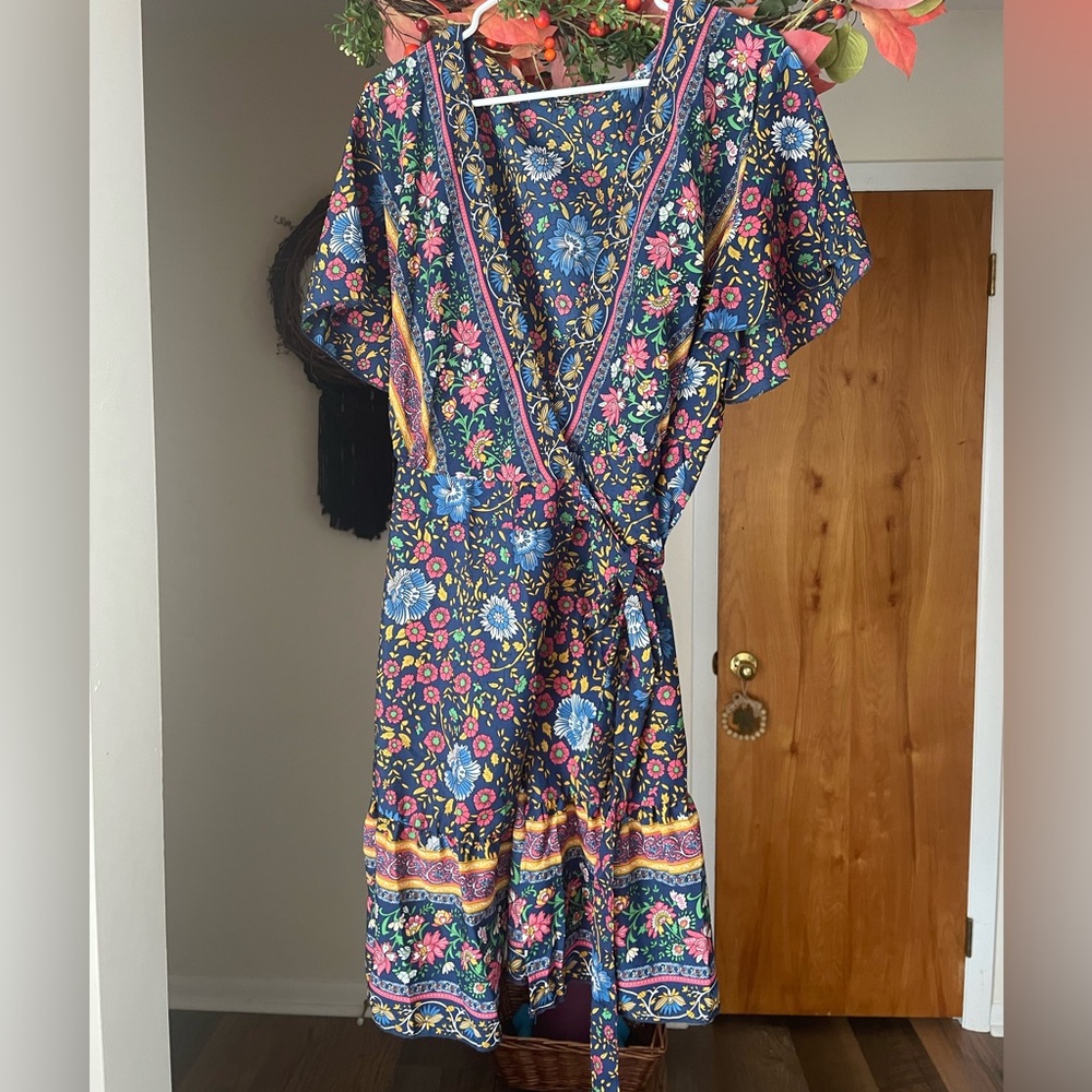 Women’s wrap around dress. Ties on the side.